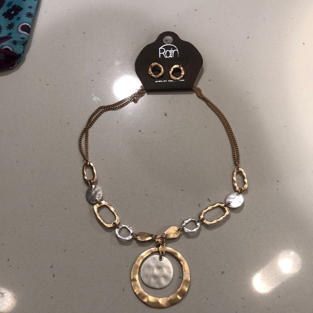 Brand New gold and silver necklace and earring set